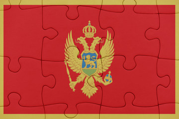 puzzle with the national flag of montenegro.
