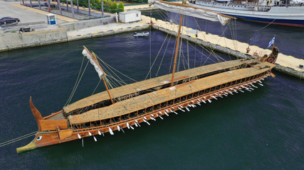 Aerial detail photo of ancient Greek warship full scale replica Trireme in port of Faliron, Attica, Greece © aerial-drone