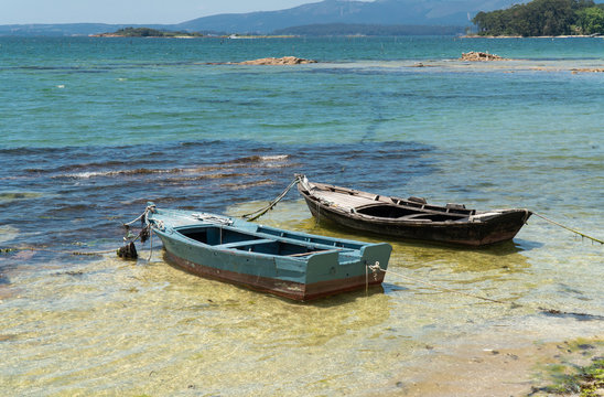 Marine landscape of Rias Baixas, Galicia with two small boats called Chalanas