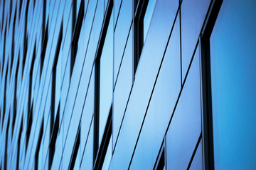 Office building windows background. Glass facade of an office building