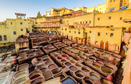 Sightseeing of Morocco. Tanneries of Fez. Dye reservoirs and vats in traditional tannery of city of Fez, Morocco