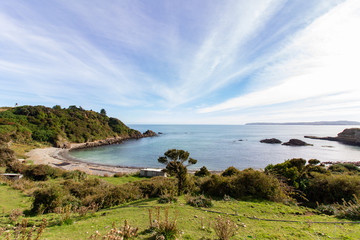 Fototapeta na wymiar Chilean Chiloe Island Coast Landscape. Pacific coast landscape
