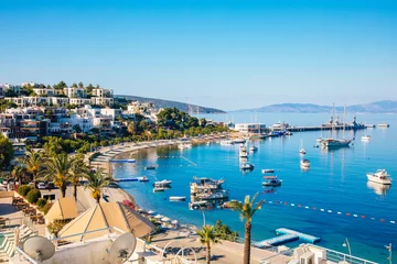 View of Bodrum Beach, Aegean sea, traditional white houses, marina, sailing boats, yachts in Bodrum town Turkey.  © Hakan Tanak