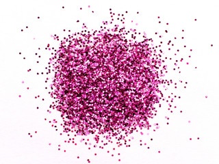 Pink glitter sparkle on white background with place for your text