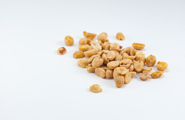 Color photo of peanuts on an isolated white background with room for copy.