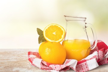 Orange juice and slices of orange on background © BillionPhotos.com