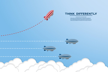 Think differently concept. Be different. Red zeppelin changing direction. New idea, change, trend, courage, creative solution, innovation and unique way concept. © madedee