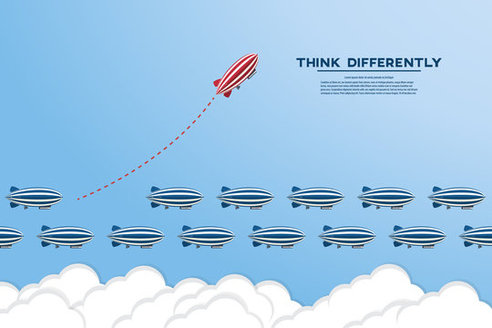 Think differently concept. Be different. Red zeppelin changing direction. New idea, change, trend, courage, creative solution, innovation and unique way concept.