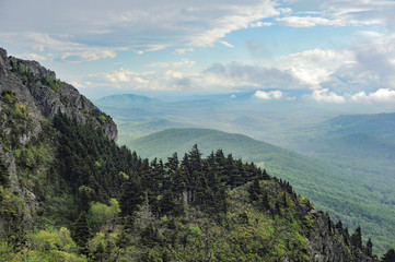 Fototapeta na wymiar Gorgeous view of the North Carolina mountains showing clouds hovering above the peaks