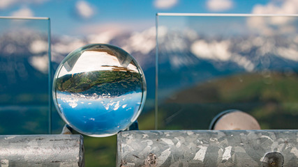 Crystal ball alpine landscape shot at Hohe Salve summit - Söll - Tyrol - Austria
