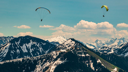 Beautiful alpine view with paragliders at Hohe Salve summit - Söll - Tyrol - Austria