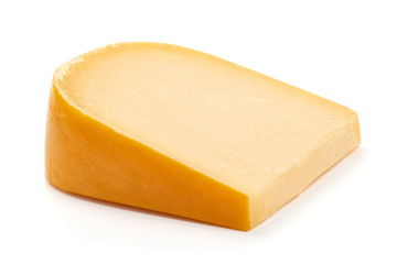 Hard Dutch gouda cheese, close-up, isolated on white background