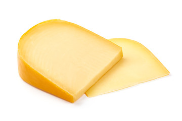 Hard Dutch gouda cheese, close-up, isolated on white background