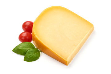 Traditional Dutch Gouda cheese, close-up, isolated on white background