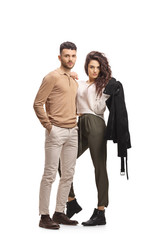 Casual young couple standing and posing