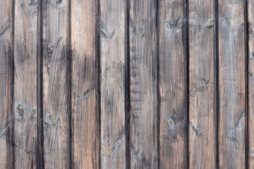 Wooden wall, old wood boards. Dark weathered panels texture with knots for the background