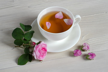Cup of tea and rosebuds