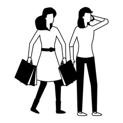 woman using smartphone and woman with shopping bags