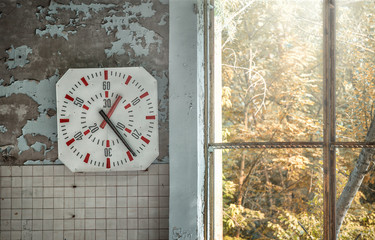 Clock and window in abandoned swimming pool "Lazurnii", Chernobyl Alienation Zone