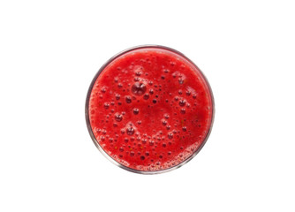 Top view of transparent glass with sweet thick red berry strawberry juice