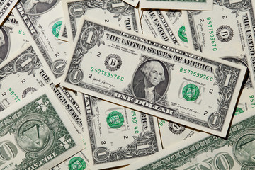 A background with american one dollar bills