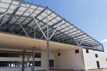 Sandwich panels on the metal frame. Material for warming the walls during construction. Technologies in construction. An alternative to a brick building.