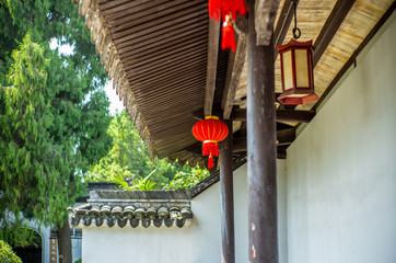 Detail of a Buddist temple in Wenzhou in China, lantern, roof and dragons - 2