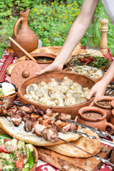 Caucasian food Georgian shashlik khinkali salad Dinner table