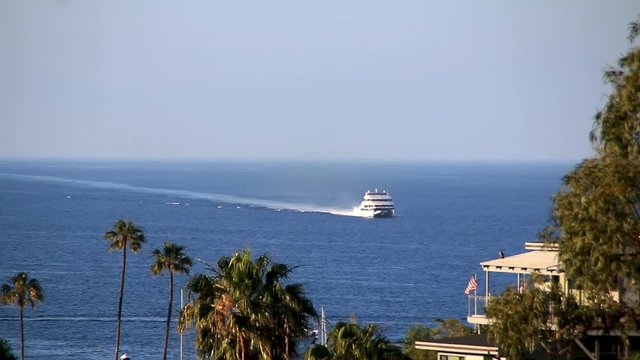 Large boat arriving to Catalina Island in California on sunny day