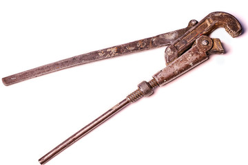 Old plumbing key isolated on white background