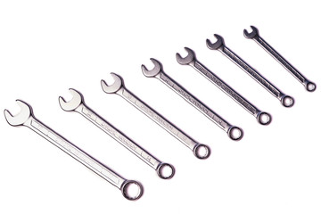 A lot of wrenches isolated on white background