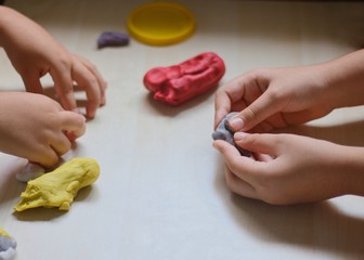 kids playing with play dough