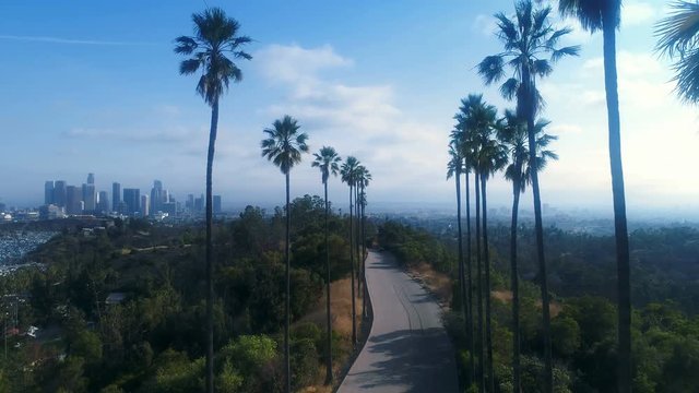 Drone clip over winding road in hills above Los Angeles - 4k UHD
