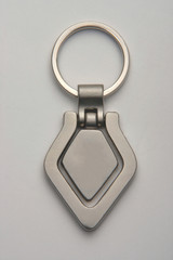 Keychain made of metals such as aluminum, brass, chrome which can be inscribed and emblemed for promotion.