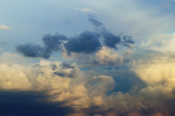 Beautiful stormy cumulus clouds in the sky, background.
