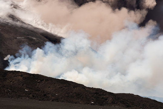 Mount Etna Volcano Erupts, Volcanic Ash Clouds & Steam Eruption. Catania, Sicily, May 2019