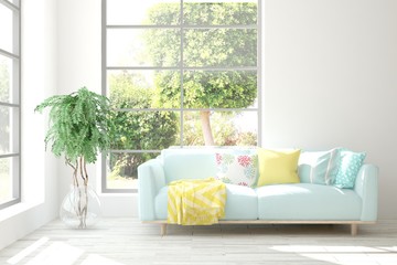 Stylish room in white color with sofa and summer landscape in window. Scandinavian interior design. 3D illustration