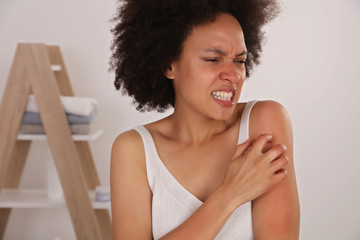 Woman Scratching an itch . Sensitive Skin, Food allergy symptoms, Irritation