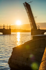 St. Petersburg beautiful cityscape at sunrise. Trinity Bridge in the rays of dawn.