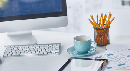 A cup of coffee on the office table