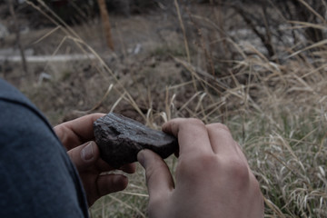 man holding rock