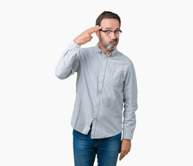 Handsome middle age elegant senior man wearing glasses over isolated background Shooting and killing oneself pointing hand and fingers to head, suicide gesture.