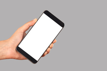 hands holding a smart phon and showing empty screen