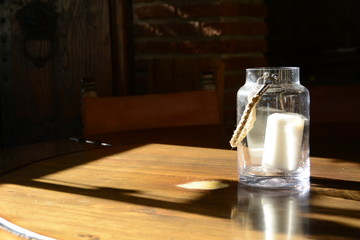 Vela en frasco de vidrio