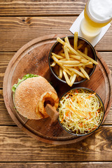 burger with french fries and salad