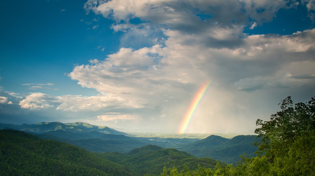 Stunning spring rainbow view of the north mountains from Black Mountain, NC, USA.