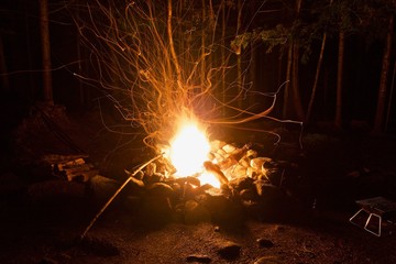 A cozy campfire captured by a long exposure.  - 274336976