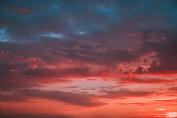 Obraz premium Dramatic sunset sky with multicolor clouds