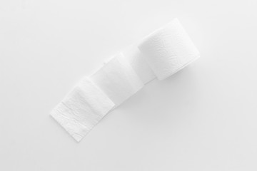 Toilet paper roll on white background top view