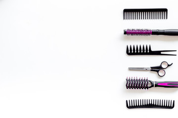 Set of professional hairdresser tools with combs and sciccors on white background top view mock up